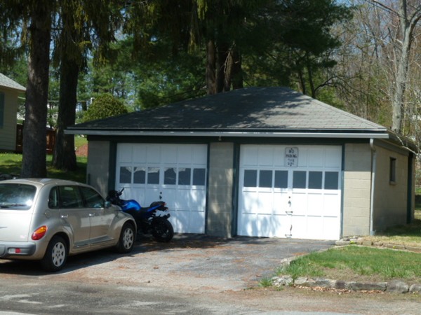 22 Groton-Harvard Road Ayer, MA 01432 - Photo 2 of 6 a view of a car parked in front of a house