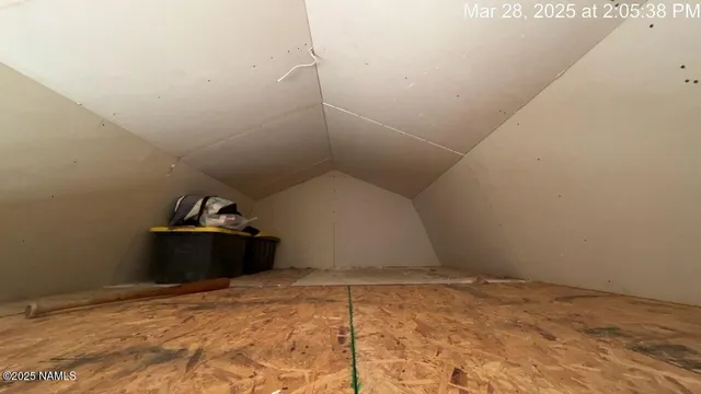 a view of a room with rack on the wall