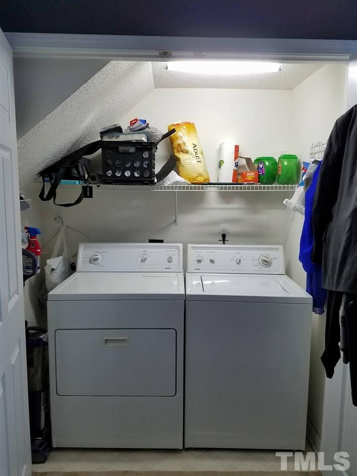 5462 Patuxent Drive Raleigh, NC 27616 - Photo 11 of 25 a utility room with dryer and washer