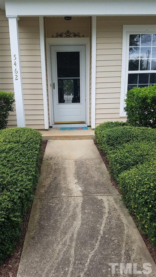 5462 Patuxent Drive Raleigh, NC 27616 - Photo 2 of 25 a front view of a house with a yard