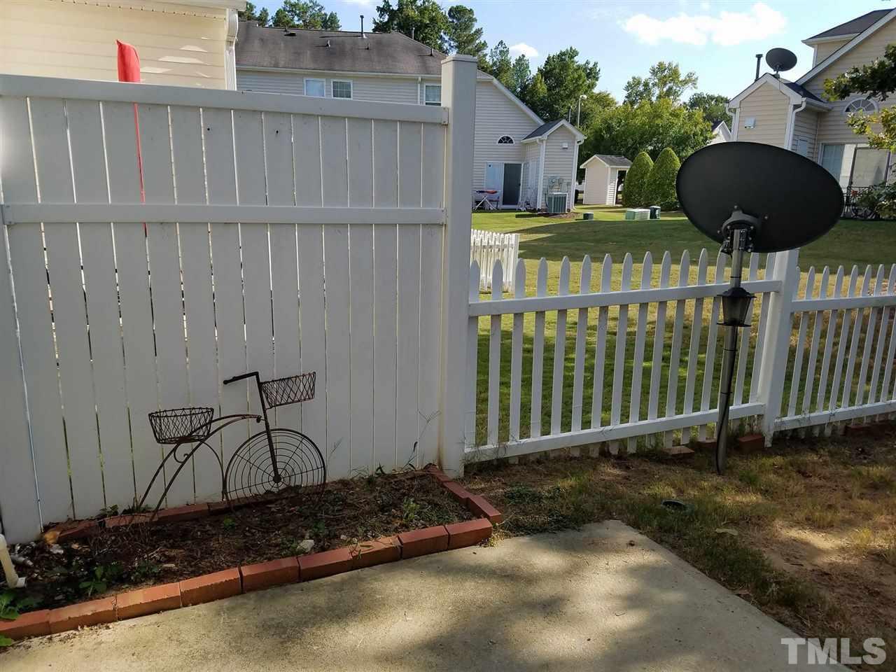 5462 Patuxent Drive Raleigh, NC 27616 - Photo 21 of 25 a front view of a house having yard