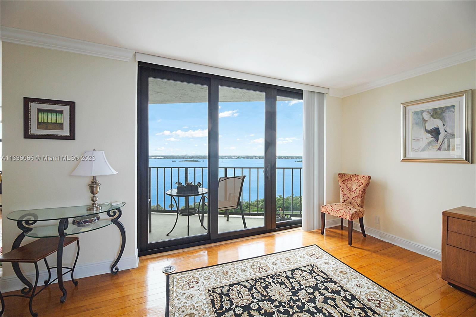 5420 North Ocean Drive, Unit 1205 Riviera Beach, FL 33404 - Photo 13 of 76 a living room with furniture and a window
