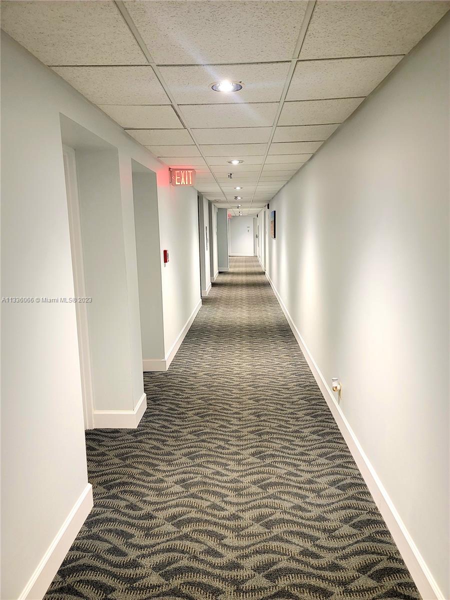 5420 North Ocean Drive, Unit 1205 Riviera Beach, FL 33404 - Photo 32 of 76 a view of a hallway