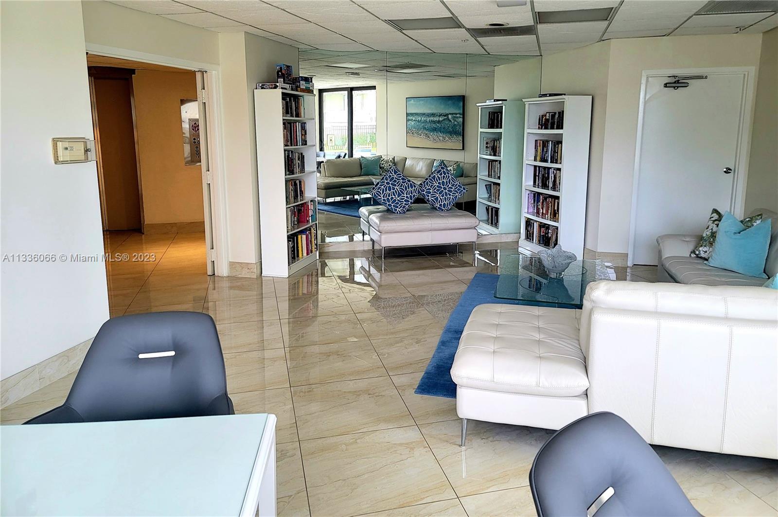 5420 North Ocean Drive, Unit 1205 Riviera Beach, FL 33404 - Photo 49 of 76 a living room with furniture and a potted plant