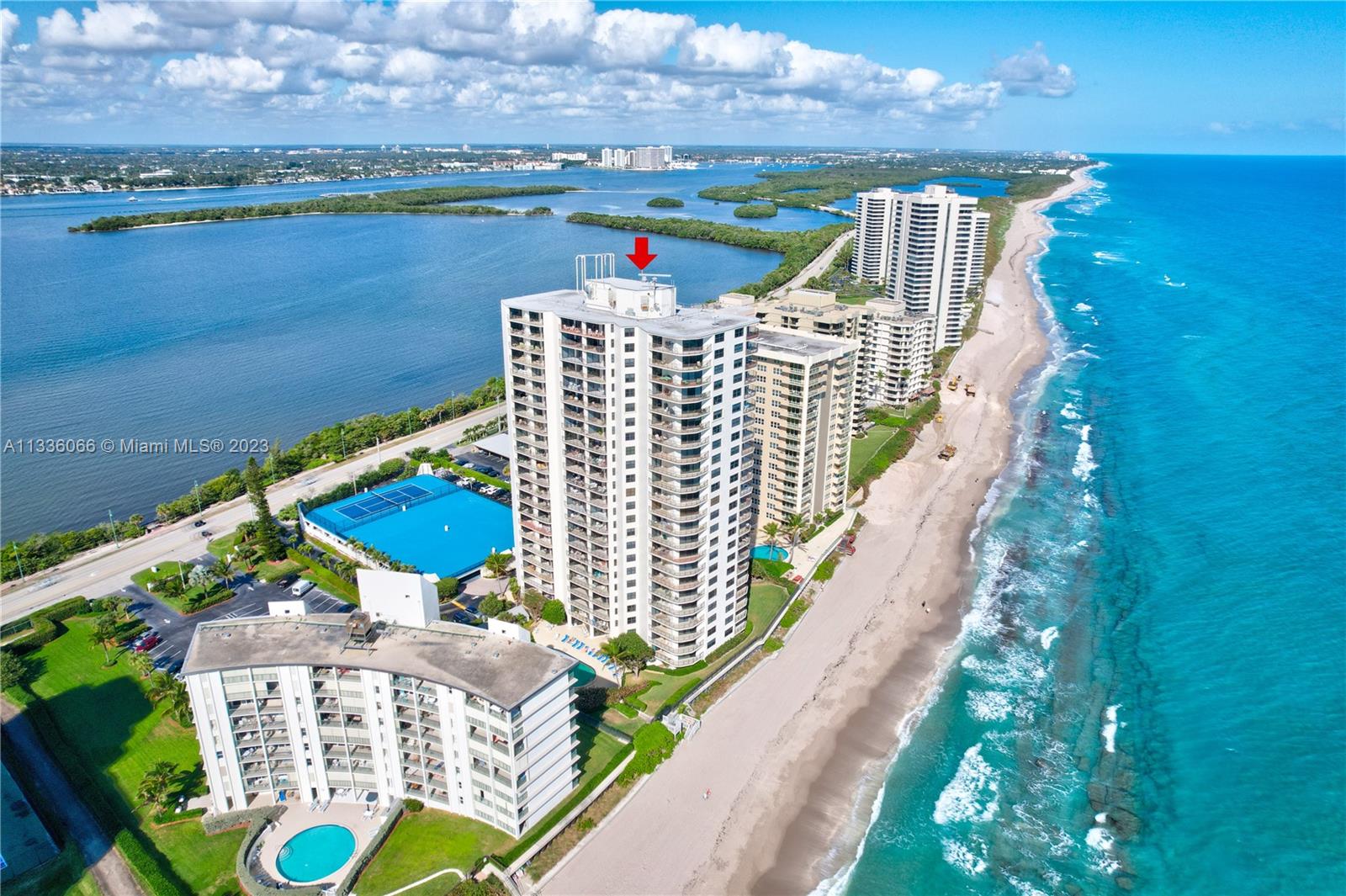 5420 North Ocean Drive, Unit 1205 Riviera Beach, FL 33404 - Photo 55 of 76 a view of building with outdoor space and seating area