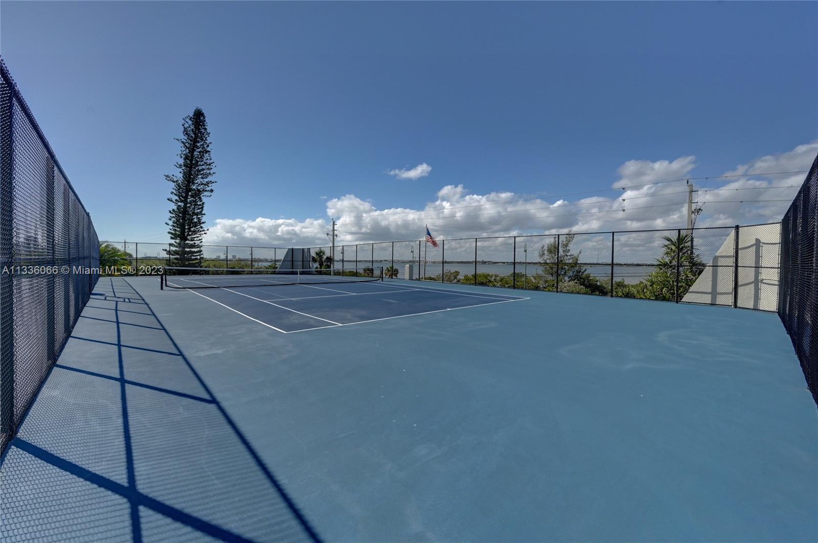 5420 North Ocean Drive, Unit 1205 Riviera Beach, FL 33404 - Photo 64 of 76 a view of a tennis court