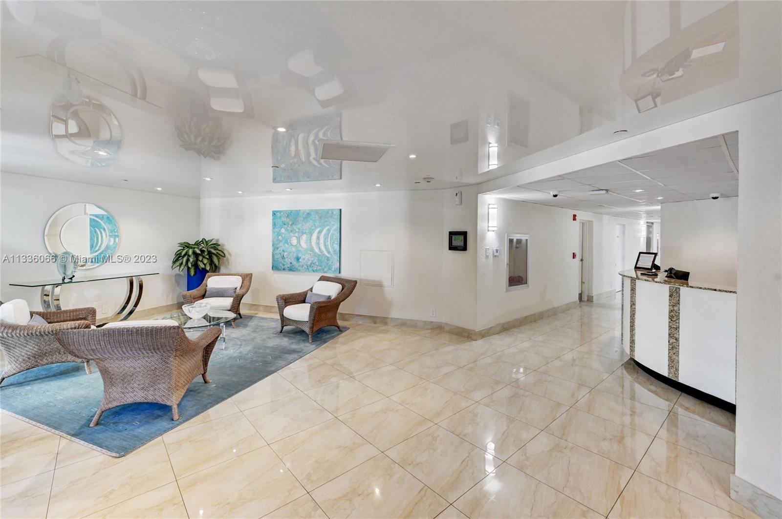 5420 North Ocean Drive, Unit 1205 Riviera Beach, FL 33404 - Photo 72 of 76 a living room with furniture and white walls