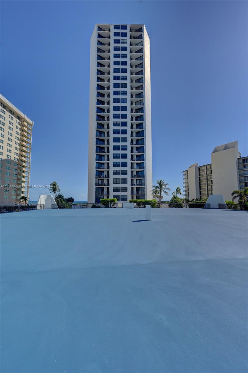5420 North Ocean Drive, Unit 1205 Riviera Beach, FL 33404 - Photo 74 of 76 a view of building with a street