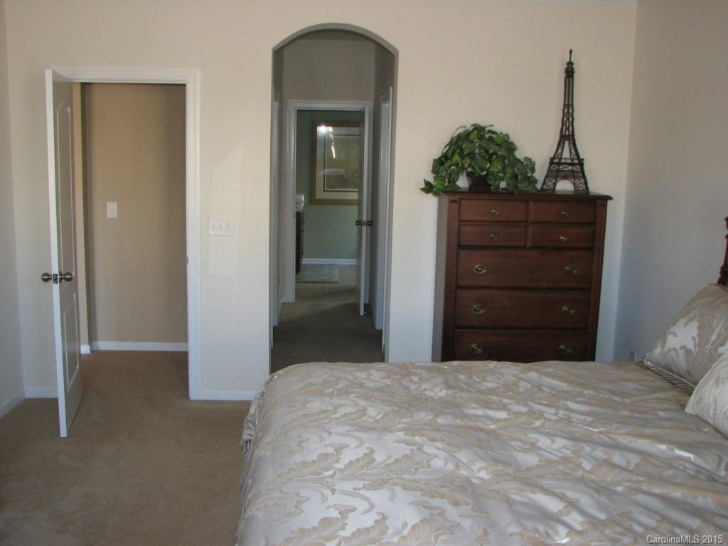 5722 Cactus Valley Road Charlotte, NC 28277 - Photo 11 of 18 a bedroom with a bed and a dresser