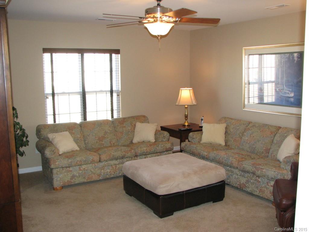 5722 Cactus Valley Road Charlotte, NC 28277 - Photo 13 of 18 a living room with furniture and a window