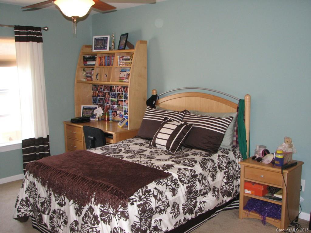 5722 Cactus Valley Road Charlotte, NC 28277 - Photo 14 of 18 a bedroom with a bed and a window
