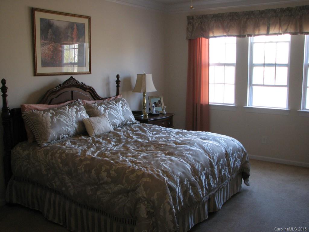 5722 Cactus Valley Road Charlotte, NC 28277 - Photo 9 of 18 a bedroom with a bed and window