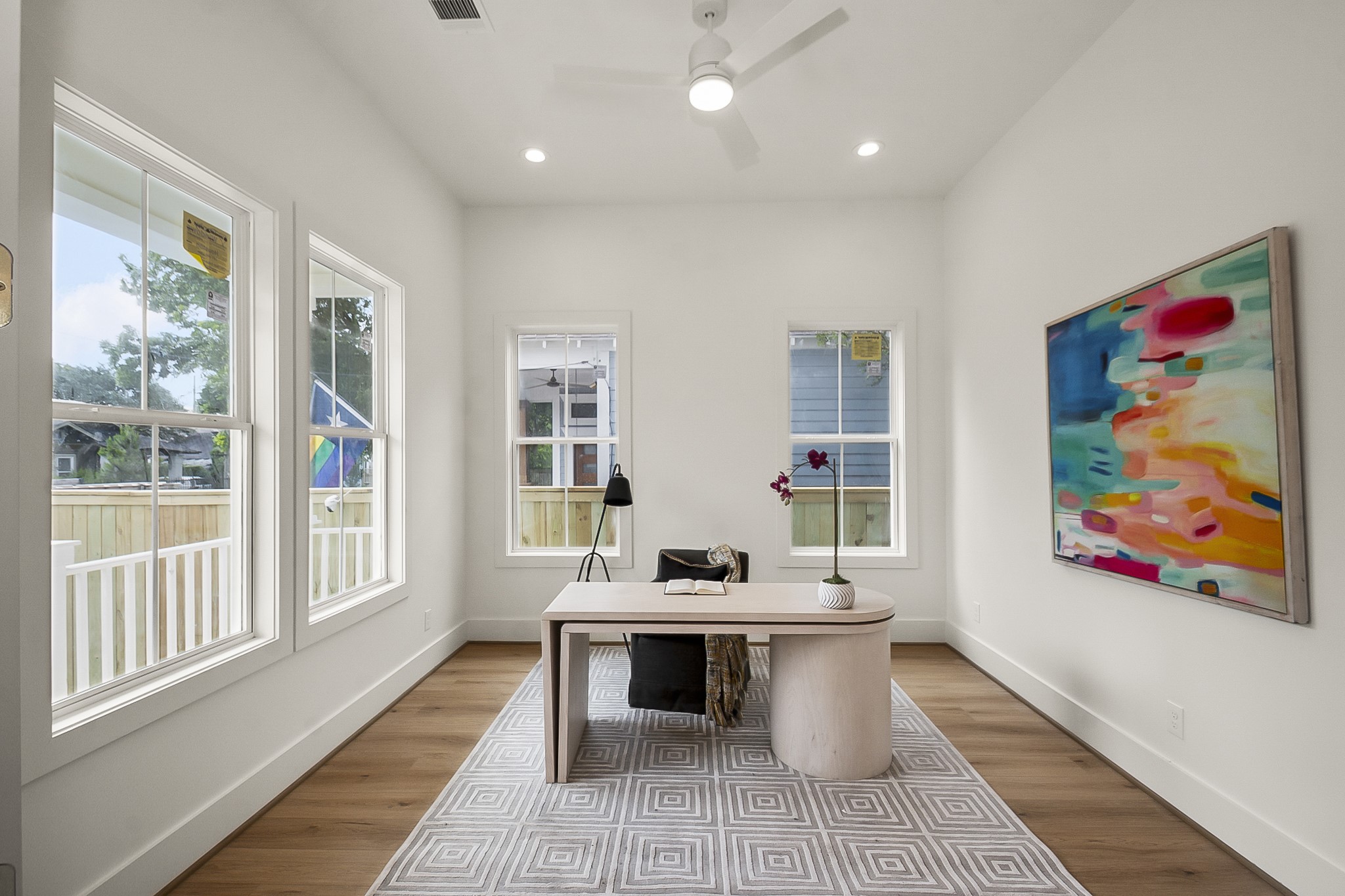 1109 Tabor Street Houston, TX 77009 - Photo 5 of 38 a work room with furniture and a rug