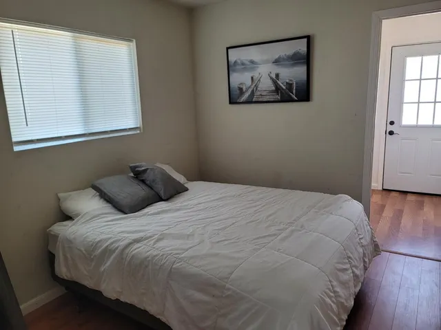 a bathroom with a toilet a sink and a mirror