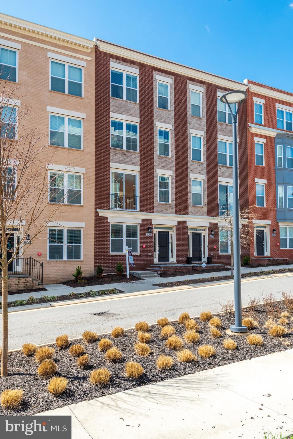 1961 Roland Clarke Place Reston, VA 20191 - Photo 2 of 50 SUNRISE SQUARE BY SEKAS HOMES