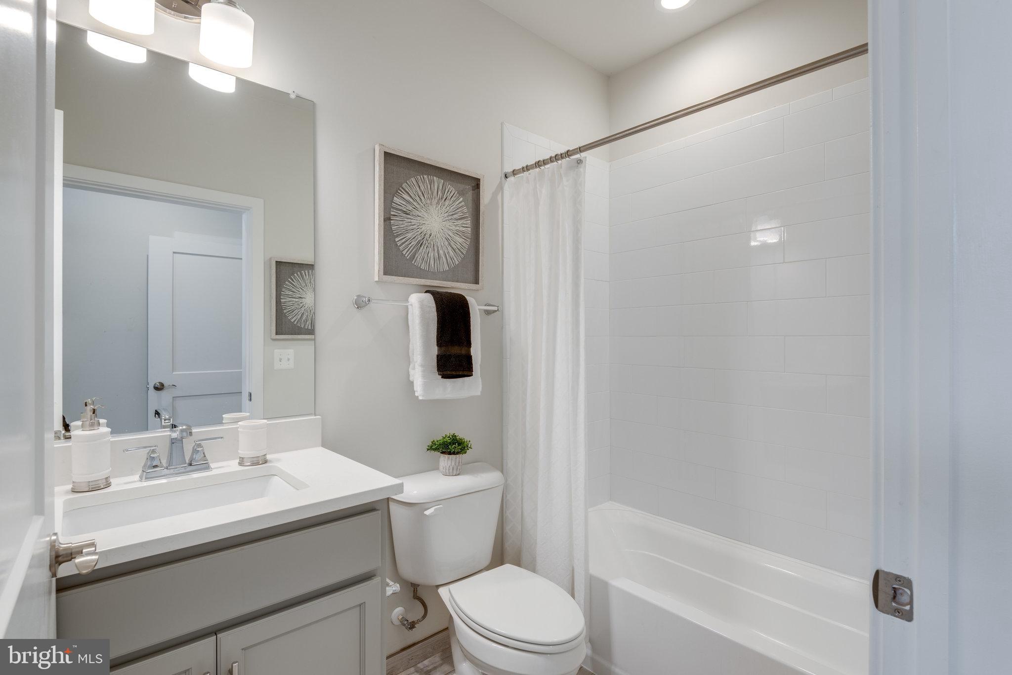 1961 Roland Clarke Place Reston, VA 20191 - Photo 8 of 50 4 FULL BATH, 1 HALF-BATH