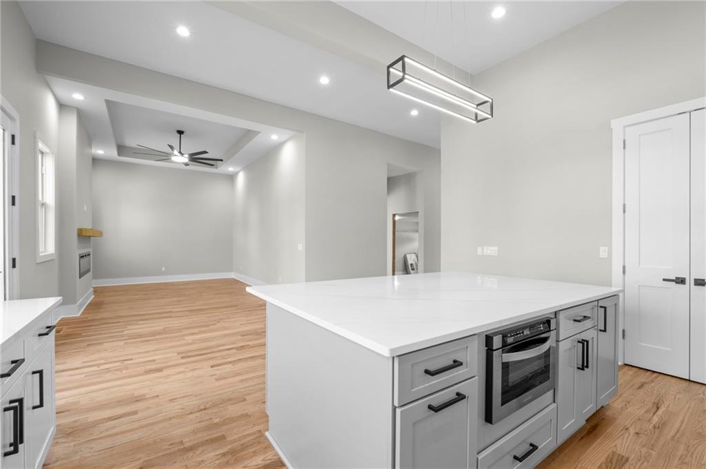 363 Marigna Avenue Scottdale, GA 30079 - Photo 11 of 33 a kitchen with a stove and a hallway