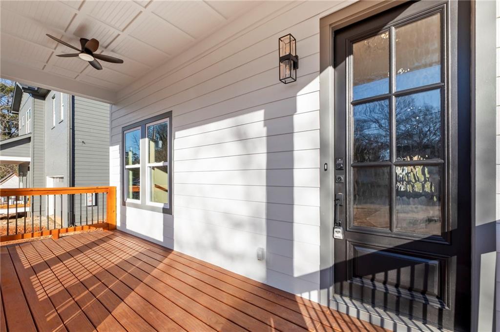 363 Marigna Avenue Scottdale, GA 30079 - Photo 2 of 33 wooden floor in a hall with a window