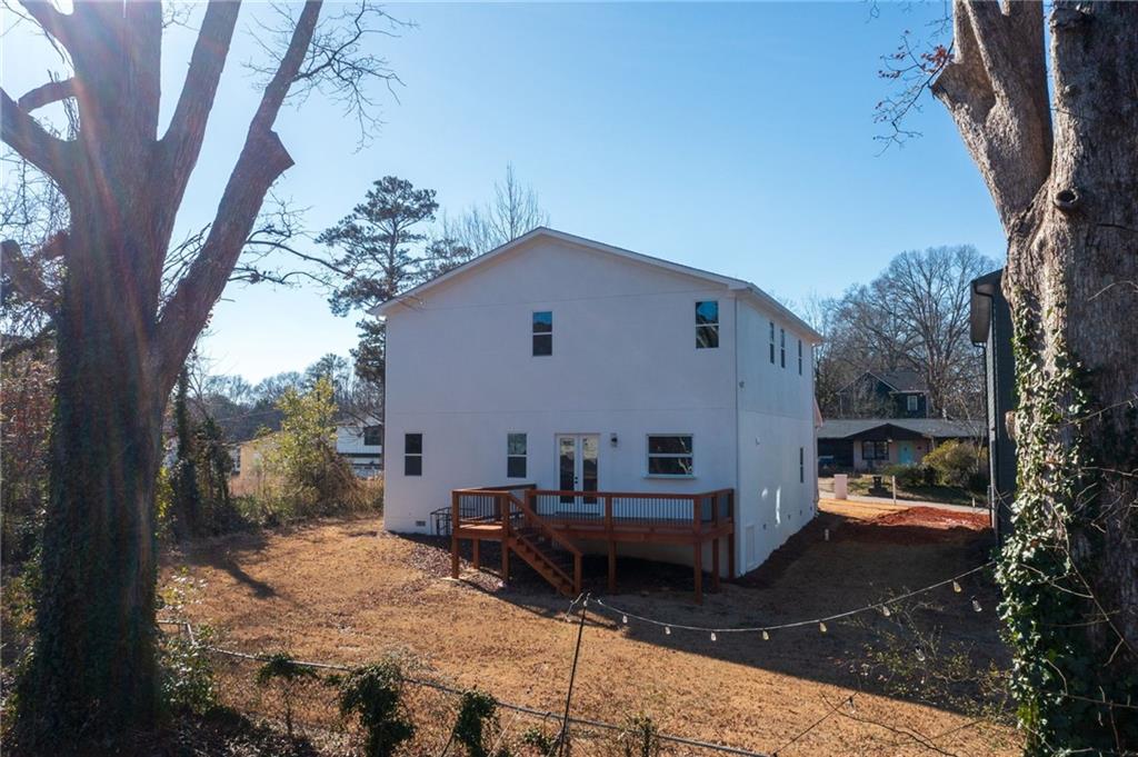 363 Marigna Avenue Scottdale, GA 30079 - Photo 31 of 33 a backyard of a house with outdoor seating