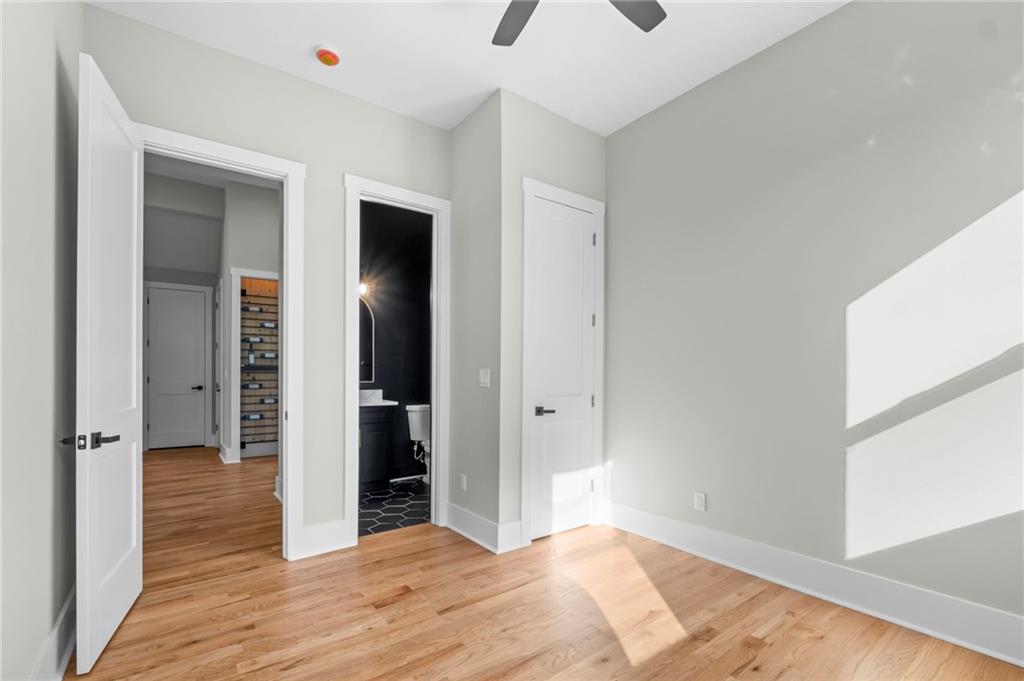363 Marigna Avenue Scottdale, GA 30079 - Photo 6 of 33 a view of an empty room with wooden floor