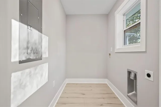 a view of room with window and ceiling fan