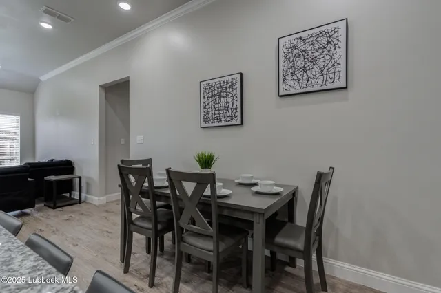 a view of a dining room with furniture