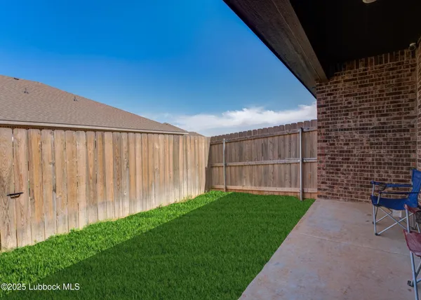 a view of backyard with hardwood