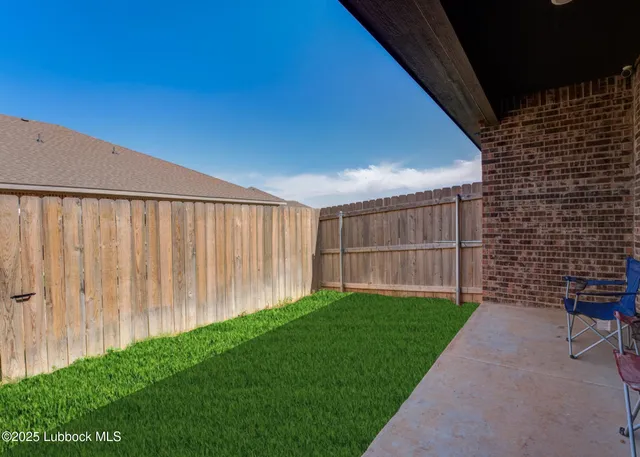 a view of backyard with hardwood