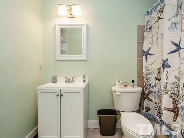 6308 Oakbrook Circle Raleigh, NC 27609 - Photo 13 of 16 Hall Bathroom