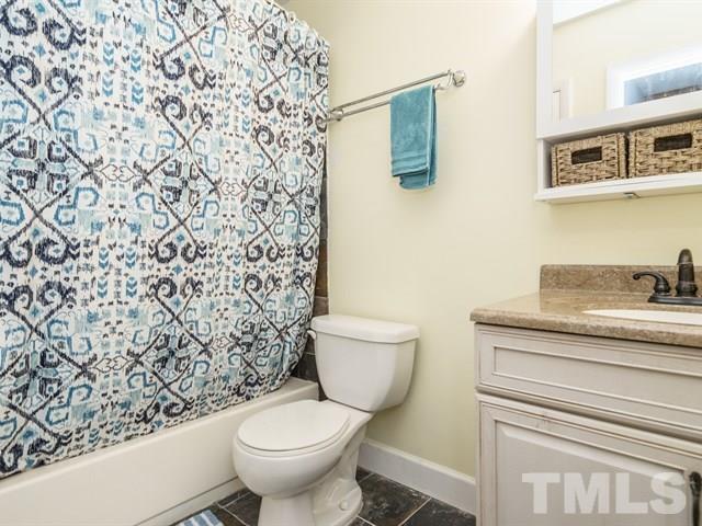 6308 Oakbrook Circle Raleigh, NC 27609 - Photo 14 of 16 Upstairs Bathroom