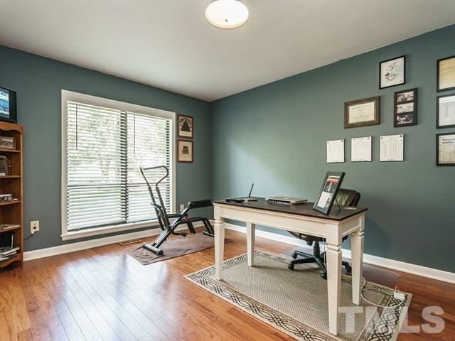 6308 Oakbrook Circle Raleigh, NC 27609 - Photo 10 of 16 The master bedroom is currently being used as an office.
