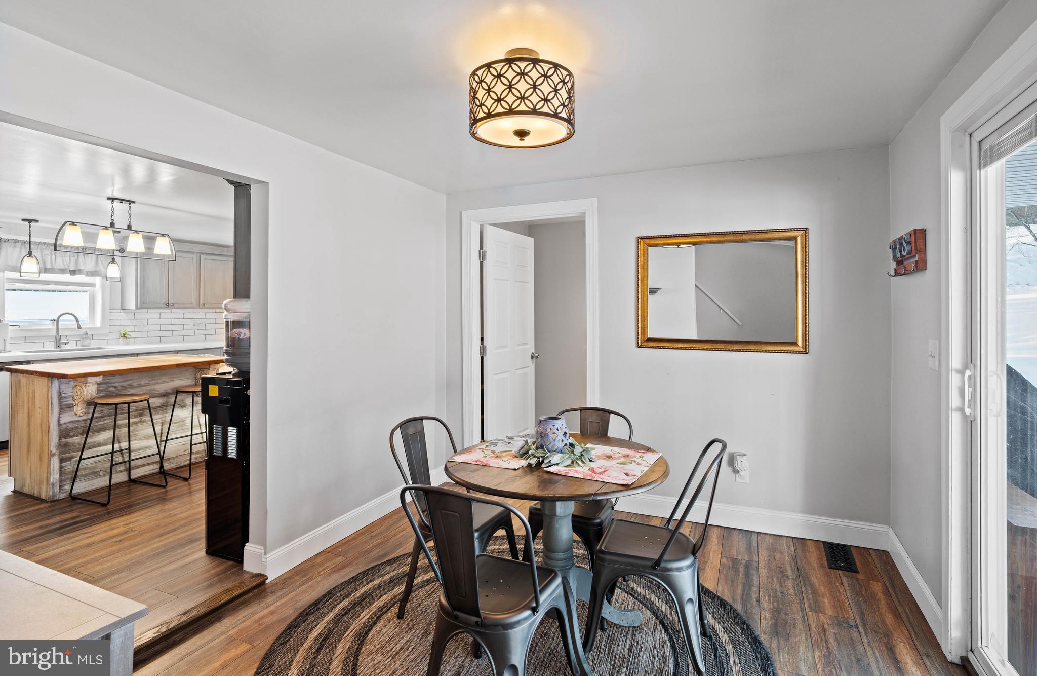 197 Ridge Street Smokerun, PA 16681 - Photo 2 of 47 a view of a dining room with furniture and wooden floor