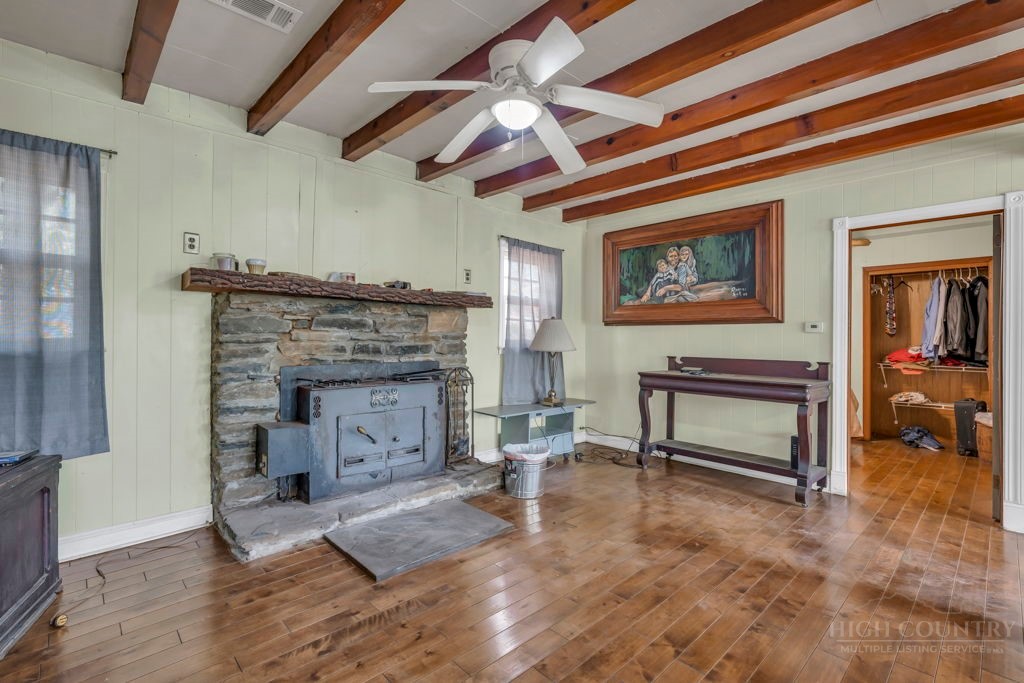 179 Soave Ridge Deep Gap, NC 28618 - Photo 13 of 31 a living room with furniture and a fireplace