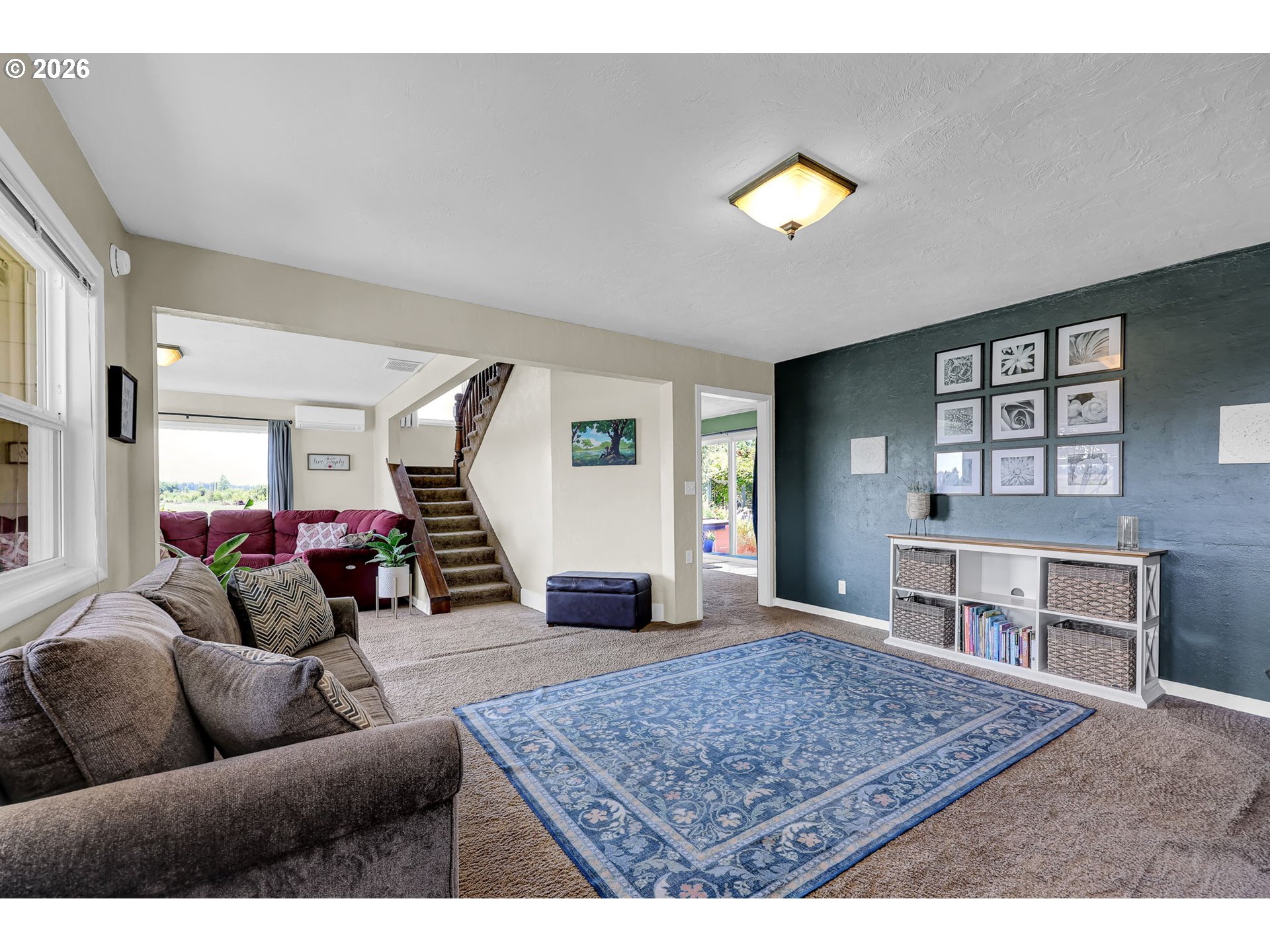 90440 Goodman Road Junction City, OR 97448 - Photo 4 of 48 a living room with furniture and a wooden floor