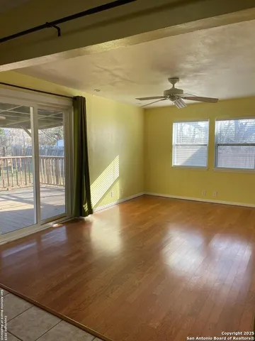 a view of an empty room and window