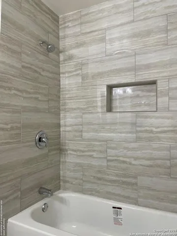a bathroom with a bathtub