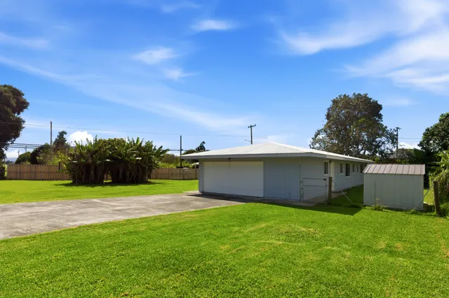 a view of a backyard with a garden