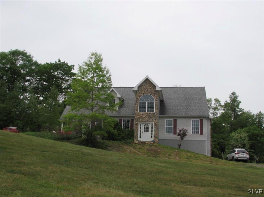 1205 Pine Run Road Lehighton, PA 18235 - Photo 1 of 39 a front view of a house with garden