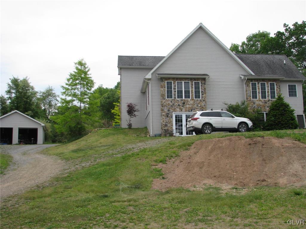 1205 Pine Run Road Lehighton, PA 18235 - Photo 38 of 39 a front view of a house with a garden