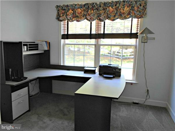 21000 Brooke Knolls Road Laytonsville, MD 20882 - Photo 15 of 20 a kitchen with a sink appliances and cabinets