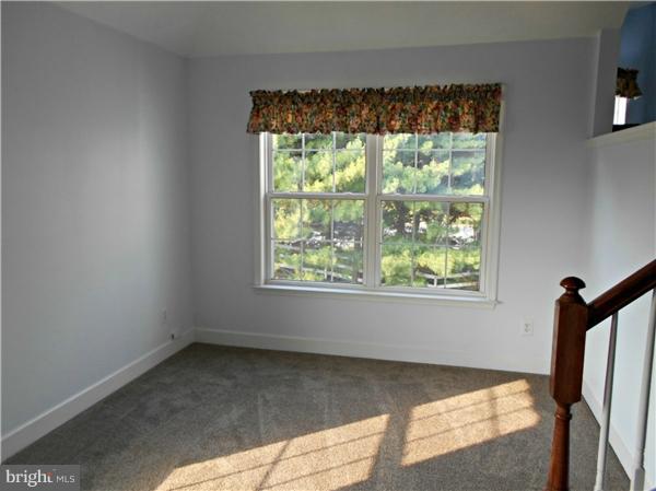 21000 Brooke Knolls Road Laytonsville, MD 20882 - Photo 18 of 20 a view of a room that has a window