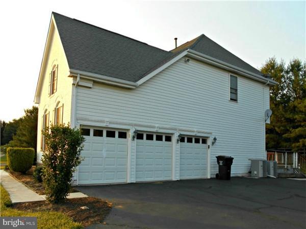 21000 Brooke Knolls Road Laytonsville, MD 20882 - Photo 3 of 20 a view of a house with a balcony