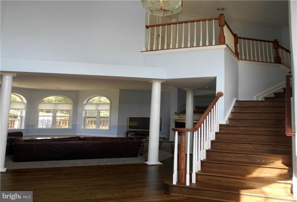 21000 Brooke Knolls Road Laytonsville, MD 20882 - Photo 8 of 20 a view of entryway and hall with wooden floor