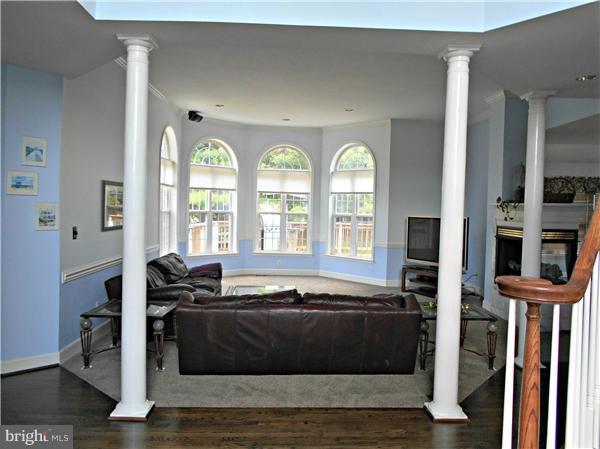 21000 Brooke Knolls Road Laytonsville, MD 20882 - Photo 9 of 20 a living room with furniture window and wooden floor