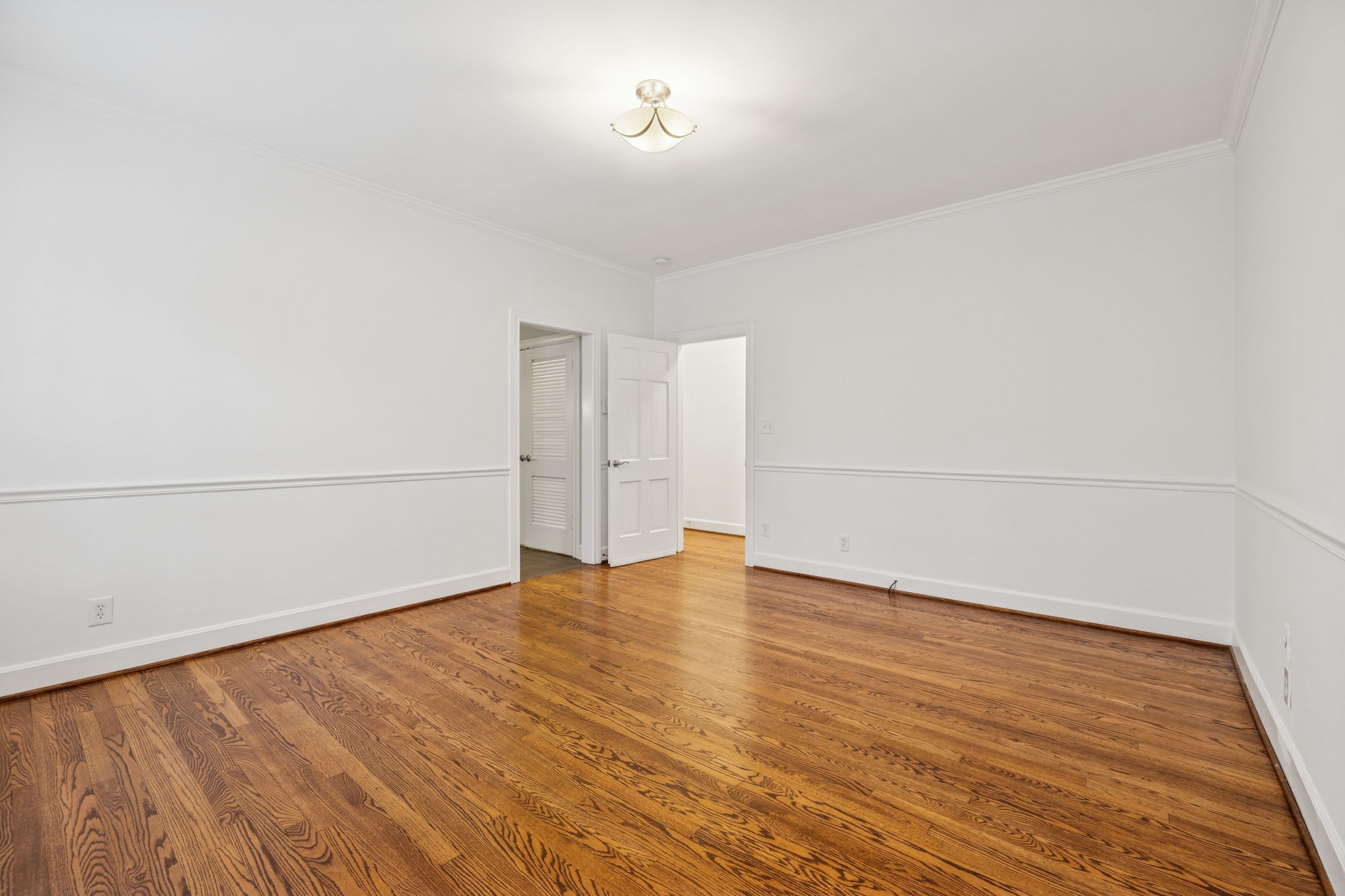 6012 Hickory Valley Road Nashville, TN 37209 - Photo 30 of 60 a view of an empty room with wooden floor