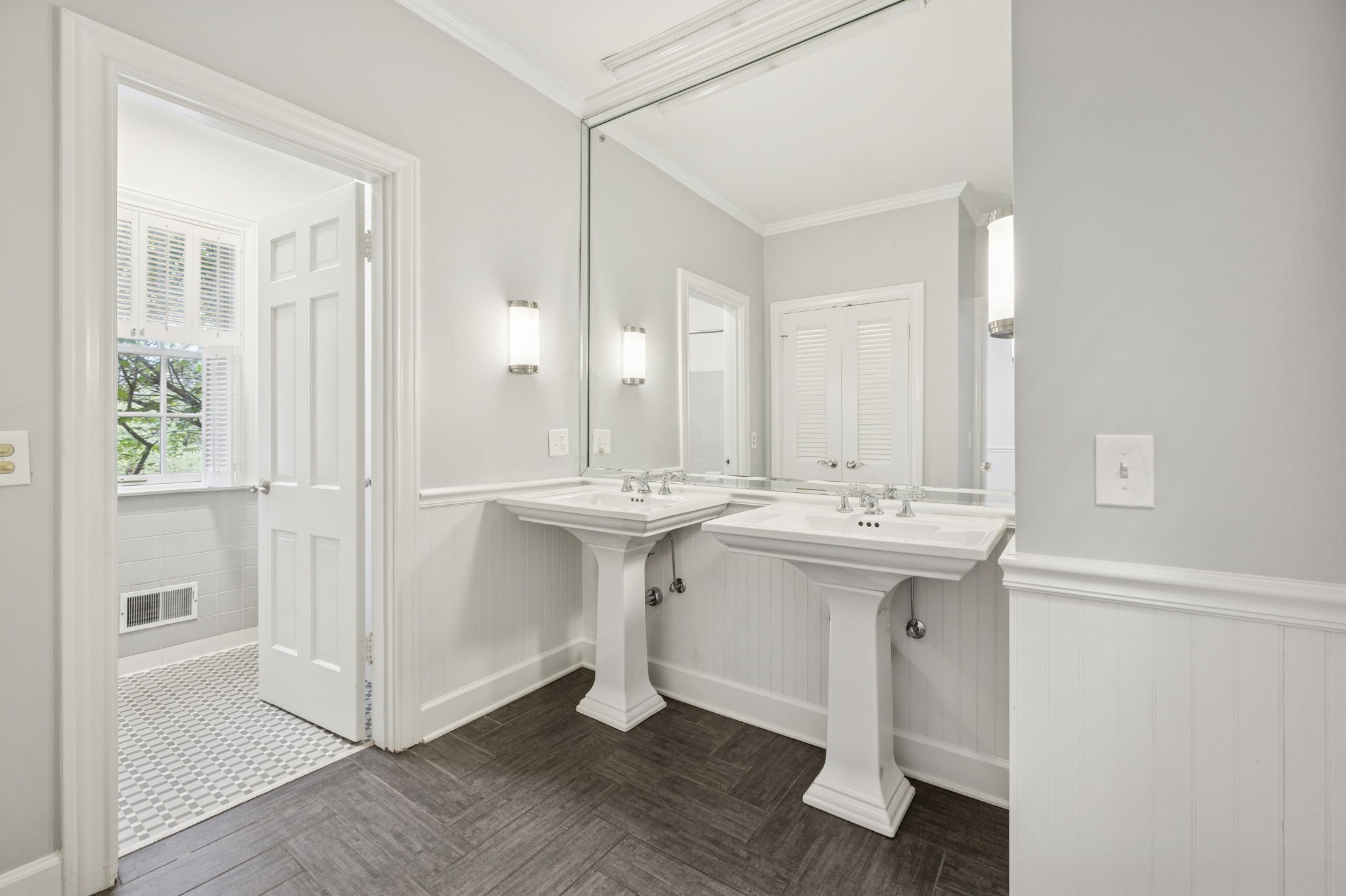 6012 Hickory Valley Road Nashville, TN 37209 - Photo 31 of 60 a bathroom with a sink and a mirror