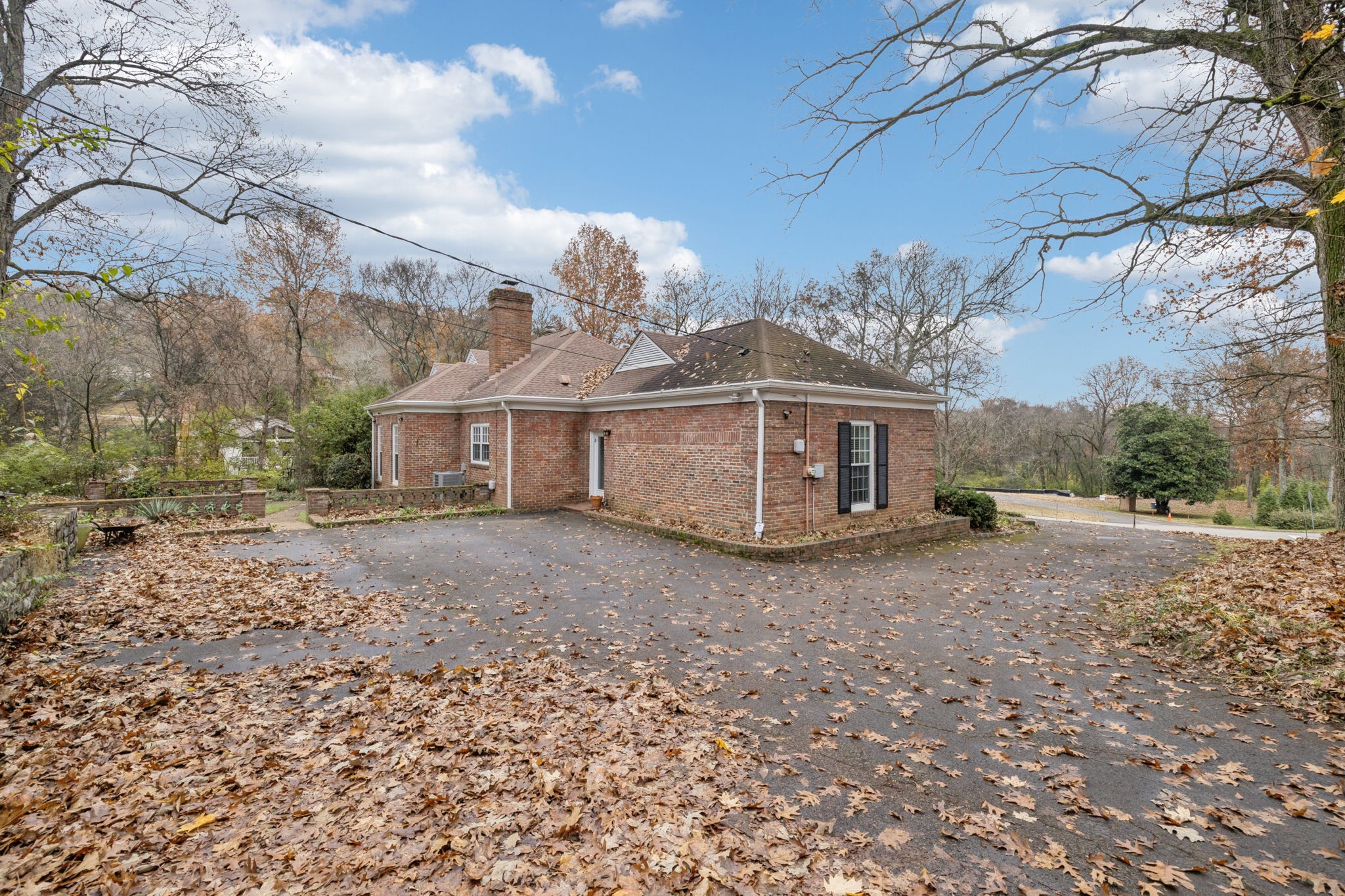 6012 Hickory Valley Road Nashville, TN 37209 - Photo 41 of 60 a view of a house with a yard