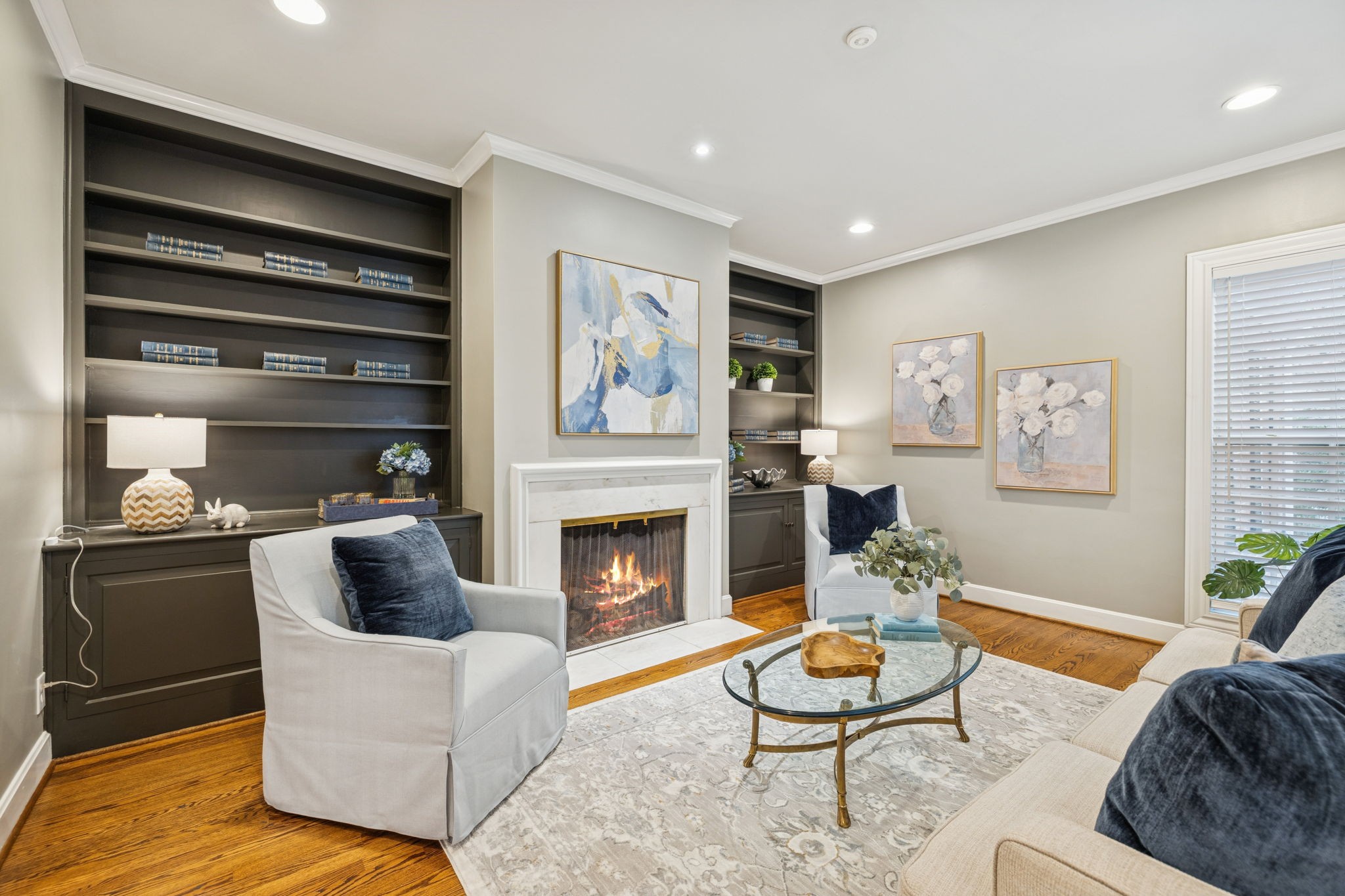 6012 Hickory Valley Road Nashville, TN 37209 - Photo 6 of 60 a living room with furniture and a fireplace