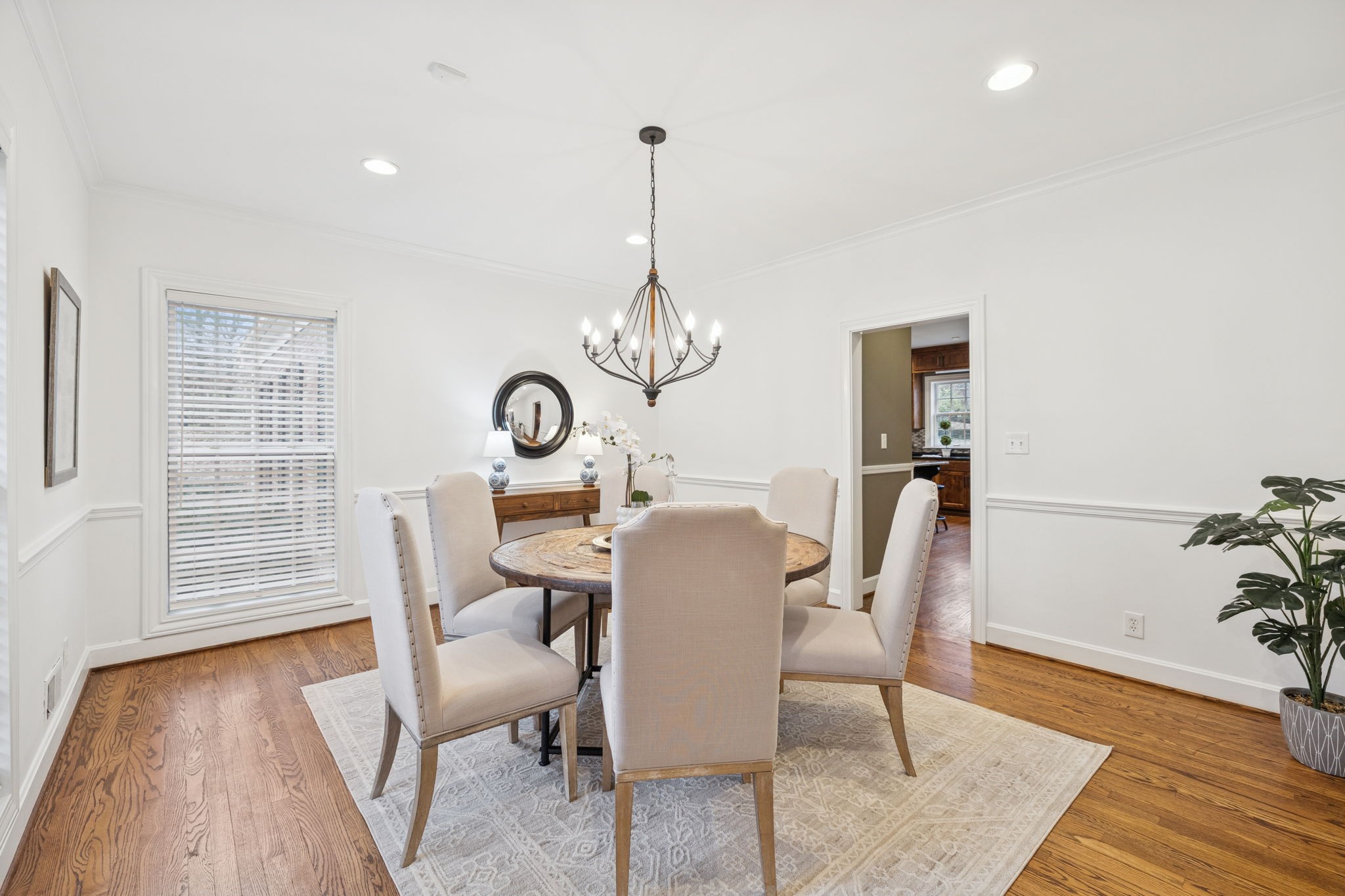 6012 Hickory Valley Road Nashville, TN 37209 - Photo 9 of 60 a view of a dining room with furniture window and wooden floor