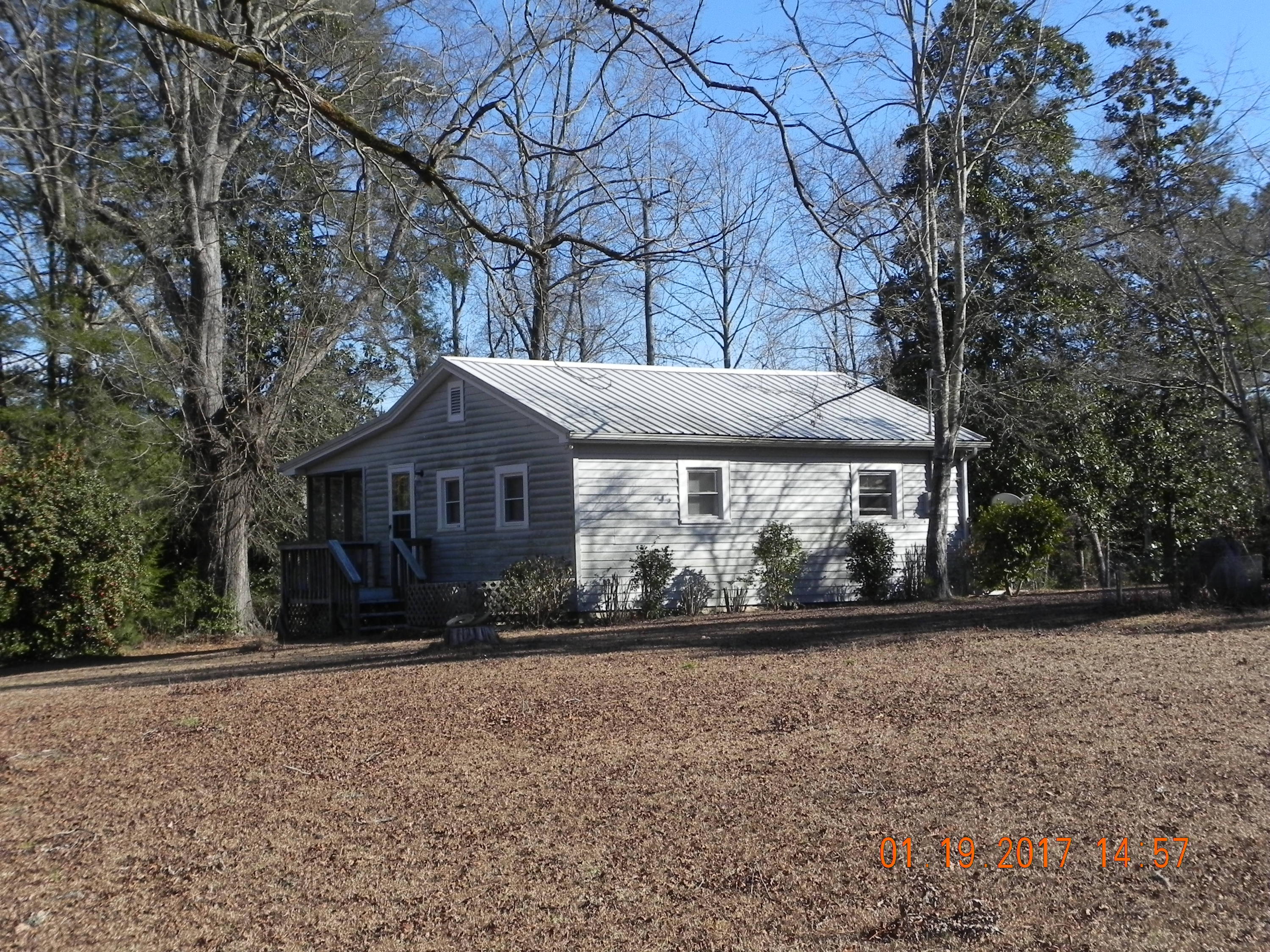 684-656 Peace Road Carthage, NC 28327 - Photo 2 of 41 656 - backyard and view of the back of the home.